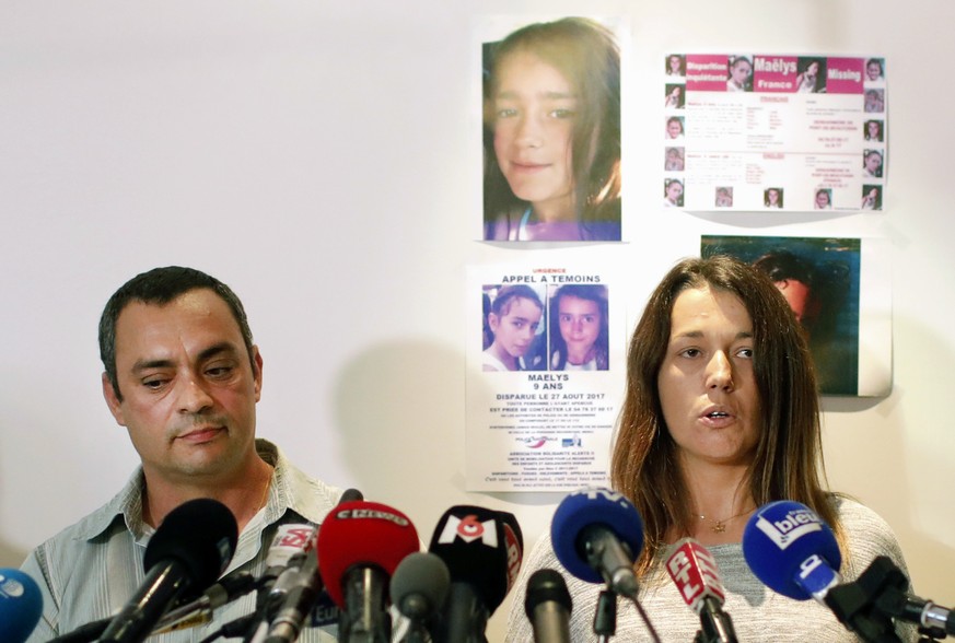 FILE - The father of killed girl, Maelys, Joachim de Araujo, left, and his wife, Jennifer, hold a press conference in Lyon, central France, Sept.28 2017. Nordahl Lelandais, goes on trial Monday Jan.31 ...