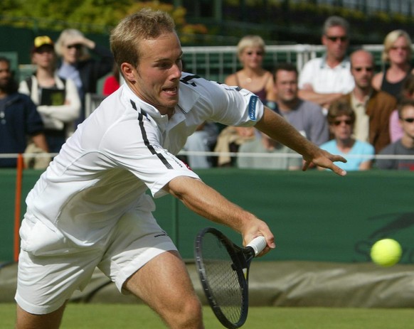 Belgian Olivier Rochus plays a forehand during his fourth round match against German Alexander Popp at the All England Lawn Tennis Championships in Wimbledon, Monday 30 June 2003. Popp won 5-7, 6-3, 6 ...