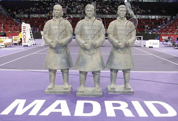 In this photo provided by Mutua Madrilena Masters Madrid Tuesday Oct. 16, 2007, three terracotta statues representing tennis players Rafael Nadal, Roger Federer and Novak Djokovic are displayed on the ...