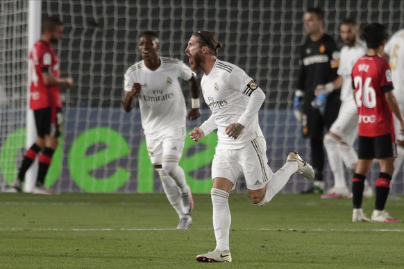 Real Madrid&#039;s Sergio Ramos celebrates after scoring his side&#039;s second goal during the Spanish La Liga soccer match between Real Madrid and Mallorca at Alfredo di Stefano stadium in Madrid, S ...
