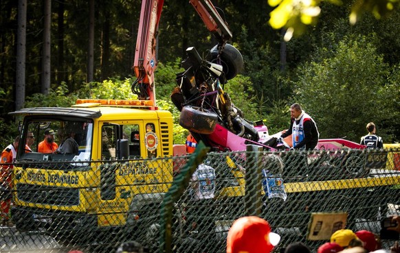 epa07808332 The car wreck of Anthoine Hubert of BWT Arden is removed during the Formula 2 race at the Spa-Francorchamps race track in Stavelot, Belgium, 31 August 2019. The French driver Anthoine Hube ...