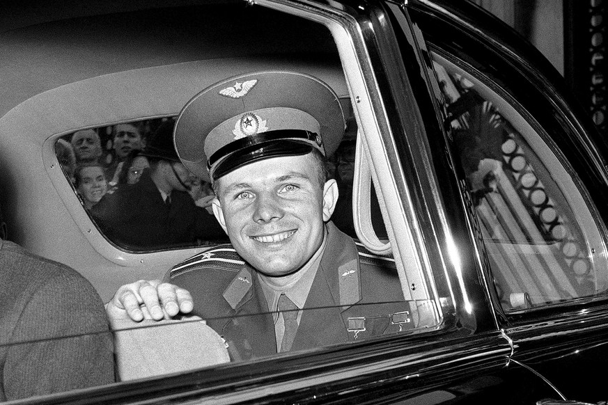 FILE - In this Friday, July 14, 1961 file photo, Major Yuri Gagarin, the Russian cosmonaut, smiles as he leaves Buckingham Palace in London, United Kingdom, after lunch with Queen Elizabeth II. He is  ...