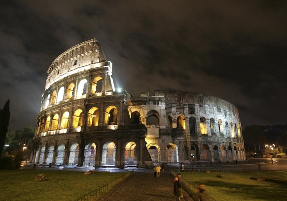 The ancient Colosseum is lit up for the occasion of the day for the abolition of the death penalty, in Rome, Wednesday, Nov. 30, 2005. Several monuments in Italy, including Rome&#039;s ancient Colosse ...