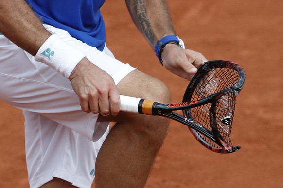 Switzerland&#039;s Stan Wawrinka deliberately breaks his racket in the men&#039;s final match against Spain&#039;s Rafael Nadal at the French Open tennis tournament at the Roland Garros stadium, in Pa ...