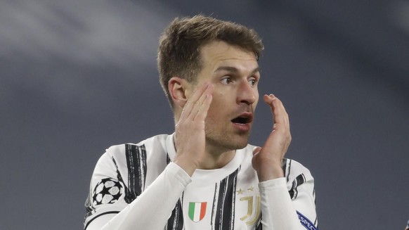 Juventus&#039; Aaron Ramsey gestures during the Champions League, round of 8, second-leg soccer match between Juventus and Porto at the Allianz stadium in Turin, Italy, Tuesday , March 9, 2021. (AP Ph ...