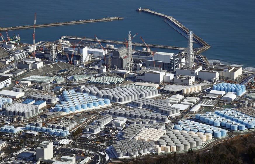 An aerial photo shows Fukushima Daiichi nuclear power plant in Okuma town, Fukushima Prefecture in January, 2021. The Japanese government has decided to get rid of the massive amounts of treated but s ...