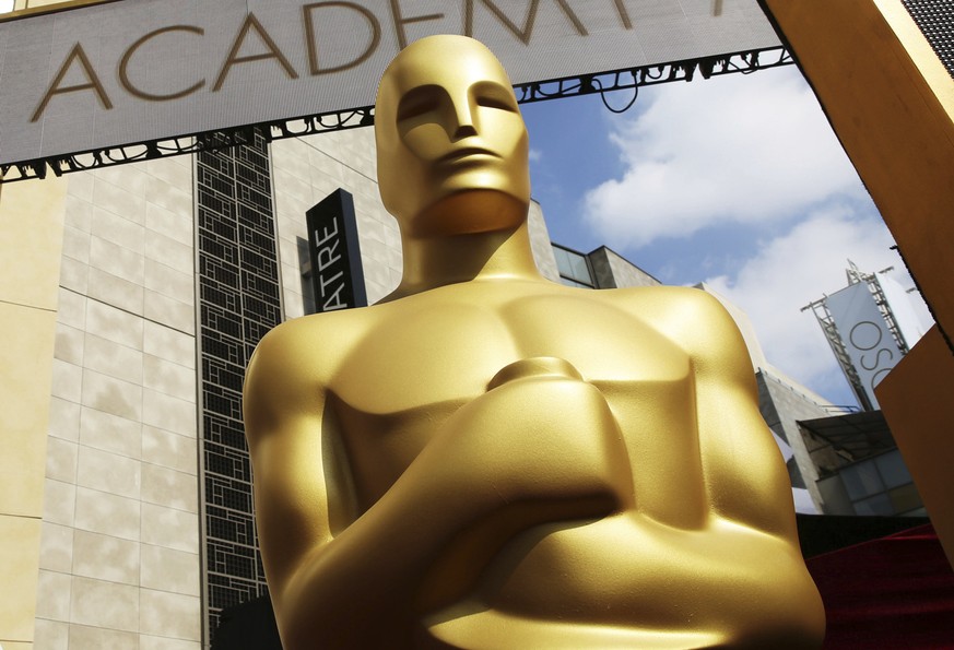 FILE - In this Feb. 21, 2015 file photo, an Oscar statue appears outside the Dolby Theatre for the 87th Academy Awards in Los Angeles. The 93rd Oscars will be held on April 25. (Photo by Matt Sayles/I ...
