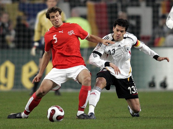 Germany&#039;s Michael Ballack, right, fights for the ball against Xavier Margairaz from Switzerland during the friendly soccer match between Germany and Switzerland at the LTU Arena in Duesseldorf, G ...