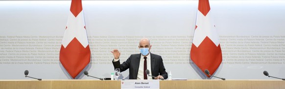 Bundesrat Alain Berset, spricht an der Medienkonferenz zu den neusten Massnahmen zur Bewaeltigung der Coronavirus-Pandemie im Anschluss an die Bundesratssitzung, am Freitag, 19. Maerz 2021 in Bern. (K ...