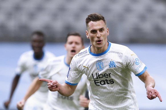 epa09043565 Marseille&#039;s Krystian Arkadiusz Milik celebrates scoring on penalty during the ligue 1 soccer match between Olympique Marseille and Olympique Lyon, in Marseille, France, 28 February 20 ...
