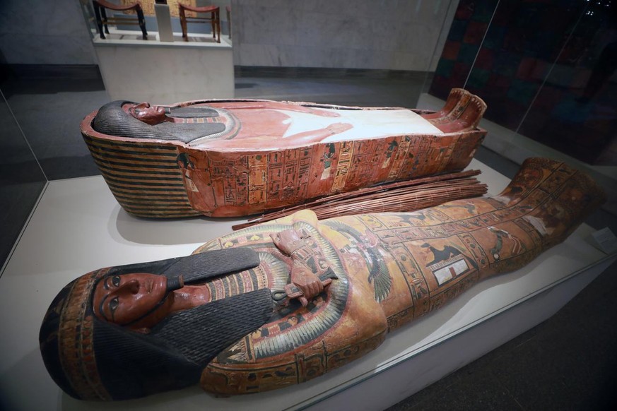 epa09116708 The wodden coffin of ancient Egyptian artisan Sennedjem is displayed in the National Museum of Egyptian Civilization after its reopening in Old Cairo, Egypt, 05 April 2021. The museum reop ...