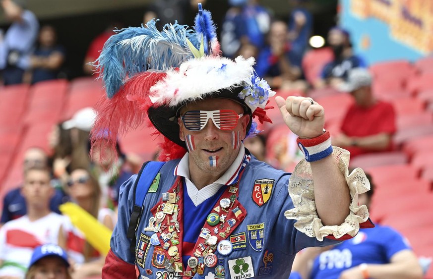 Fan cheers prior the start of the Euro 2020 soccer championship group F match between Hungary and France at the Ferenc Puskas stadium in Budapest, Hungary Saturday, June 19, 2021. (Tibor Illyes/Pool v ...