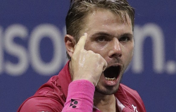 Stan Wawrinka, of Switzerland, reacts after winning the second set against Kei Nishikori, of Japan, during the semifinals of the U.S. Open tennis tournament, Friday, Sept. 9, 2016, in New York. (AP Ph ...