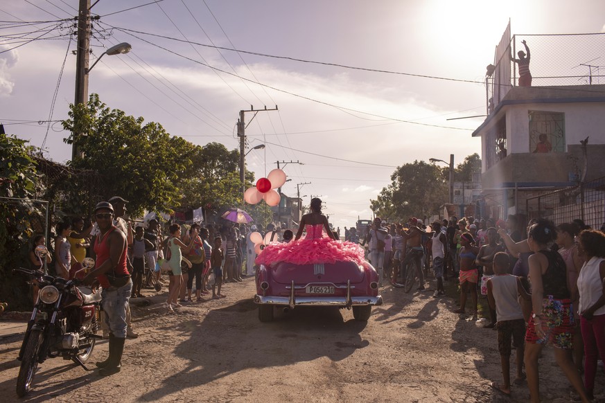 In this image released by the World Press Photo Foundation Thursday April 11, 2019, titled &quot;Cubanitas&quot; by Diana Markosian, Magnum Photos, which was awarded first prize in the Contemporary Is ...