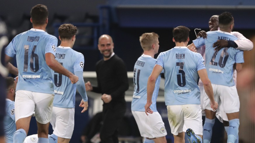 Manchester City&#039;s Riyad Mahrez celebrates with teammates after scoring his sides second goal during the Champions League semifinal first leg soccer match between Paris Saint Germain and Mancheste ...