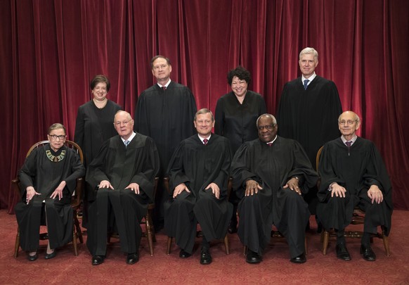 FILe - In this June 1, 2017, file photo, the justices of the U.S. Supreme Court gather for an official group portrait to include new Associate Justice Neil Gorsuch, top row, far right at the Supreme C ...