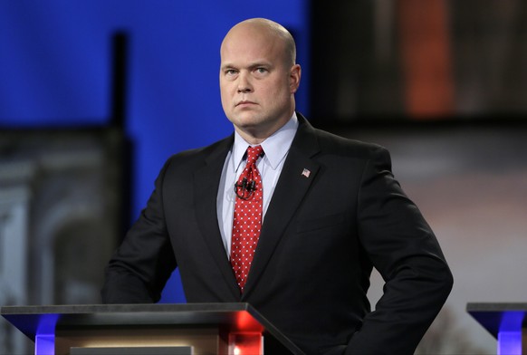 FILE - In this April 24, 2014, file photo, then-Iowa Republican senatorial candidate and former U.S. Attorney Matt Whitaker watches before a live televised debate in Johnston, Iowa. President Donald T ...
