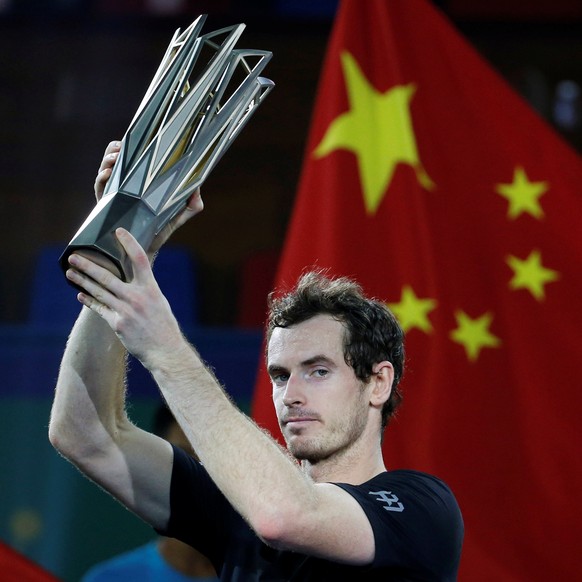 Tennis - Shanghai Masters tennis tournament final - Roberto Bautista Agut of Spain v Andy Murray of Britain - Shanghai, China - 16/10/16. Murray holds the trophy after winning tournament. REUTERS/Aly  ...