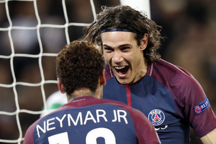 PSG&#039;s Edinson Cavani, right, celebrates after scoring his side&#039;s third goal with his teammate Neymar during a Champions League Group B soccer match between Paris St. Germain and Celtic at th ...