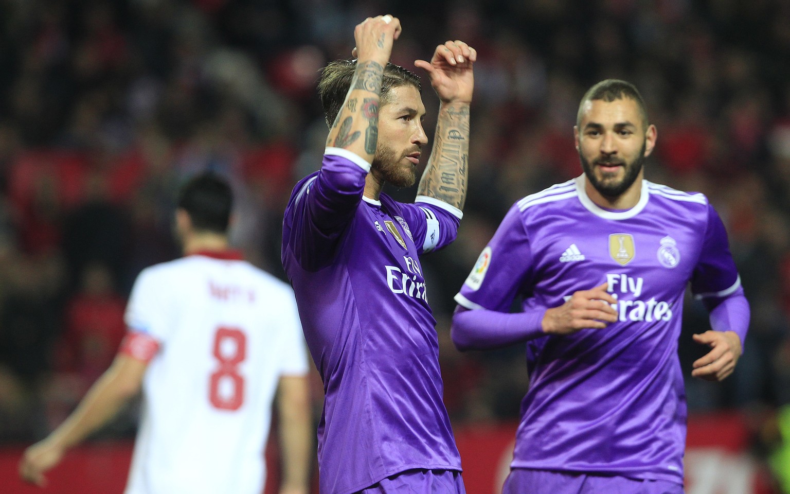 Real Madrid&#039;s Sergio Ramos celebrates after scoring against Sevilla during a Spain&#039;s King&#039;s Cup soccer match between Real Madrid and Sevilla at the Ramon Sanchez Pizjuan stadium, in Sev ...