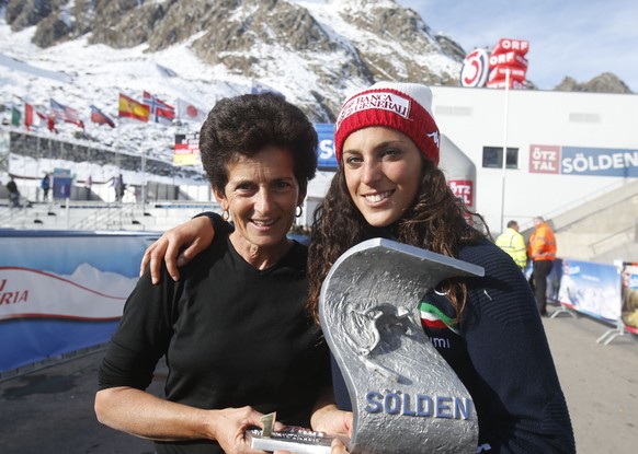 Italy&#039;s Federica Brignone poses with her mother Maria Rosa Quario after winning a Ski World Cup women&#039;s Giant Slalom in Soelden, Austria, Saturday, Oct. 24, 2015. (AP Photo/Marco Trovati)