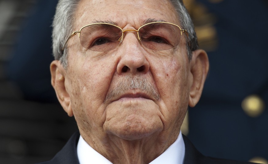 FILE - In this March 17, 2015 file photo, Cuba&#039;s President Raul Castro listens to the playing of national hymns during his welcome ceremony at Miraflores presidential palace before the start of a ...