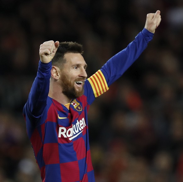 Barcelona&#039;s Lionel Messi celebrates after his team scored his side&#039;s fourth goal during a Spanish La Liga soccer match between Barcelona and Celta at Camp Nou stadium in Barcelona, Saturday, ...
