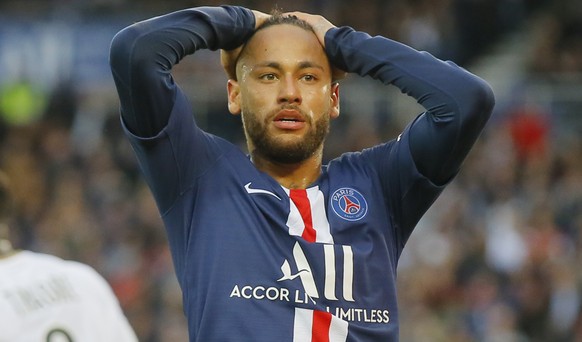 PSG&#039;s Neymar react after missing a goal opportunity during French League One soccer match between PSG and Angers at the Parc des Princes stadium in Paris, Saturday, Oct. 5, 2019. (AP Photo/Michel ...