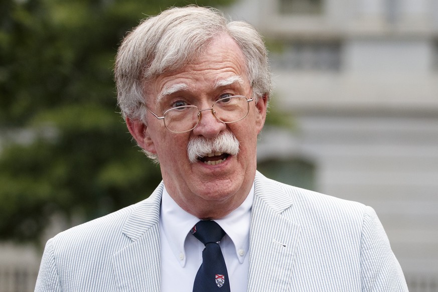 FILE - In this July 31, 2019 file photo, then National security adviser John Bolton speaks to media at the White House in Washington. Bolton says he&#039;s &#039;prepared to testify&#039; in Senate im ...