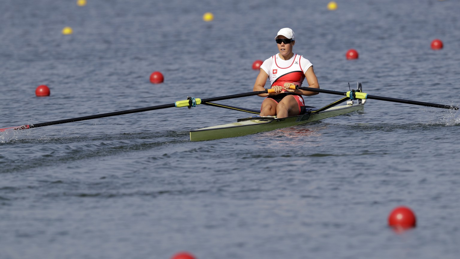 Jeanine Gmelin, of Switzerland, competes in the women&#039;s rowing single sculls quarterfinal heats during the 2016 Summer Olympics in Rio de Janeiro, Brazil, Tuesday, Aug. 9, 2016. (AP Photo/Luca Br ...