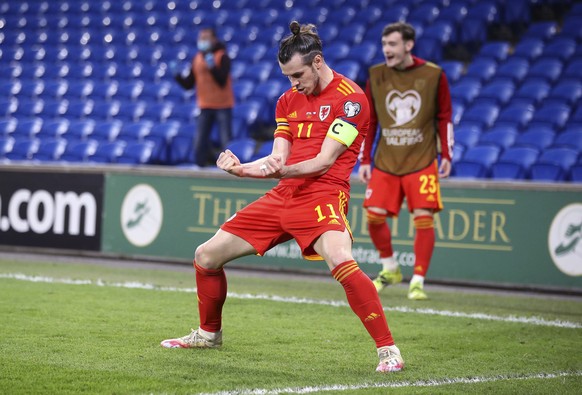 Wales&#039; Gareth Bale celebrates his side&#039;s first goal of the game during the World Cup 2022 group E qualifying soccer match between Wales and Czech Republic at Cardiff Stadium, Cardiff, Tuesda ...