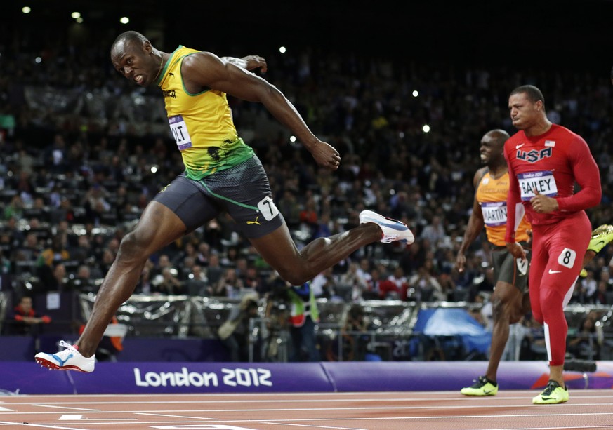FILE - In this Aug. 5, 2012, file photo, Jamaica&#039;s Usain Bolt crosses the finish line to win gold in the men&#039;s 100-meter final in the Olympic Stadium at the 2012 Summer Olympics in London. ( ...