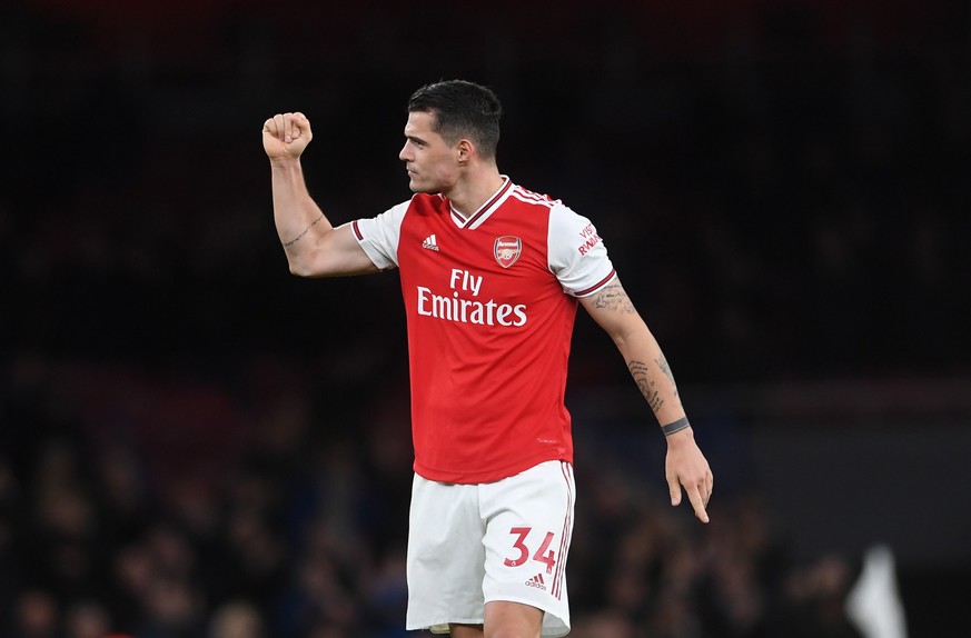 epa08242055 Arsenal&#039;s Granit Xhaka celebrates after the English Premier League soccer match between Arsenal FC and Everton FC at the Emirates Stadium in London, Britain, 23 February 2020. EPA/NEI ...