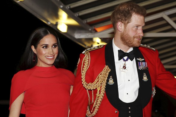 FILE - In this Saturday March 7, 2020 file photo, Britain&#039;s Prince Harry and Meghan, Duchess of Sussex arrive at the Royal Albert Hall in London. Meghan, Duchess of Sussex has her first post-roya ...