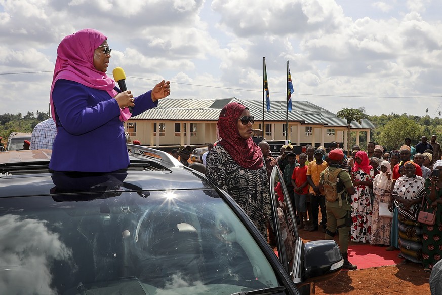 FILE - In this Tuesday, March 16, 2021, file photo, Tanzania&#039;s then Vice President Samia Suluhu Hassan, left, speaks during a tour of the Tanga region of Tanzania. Samia Suluhu Hassan has been sw ...