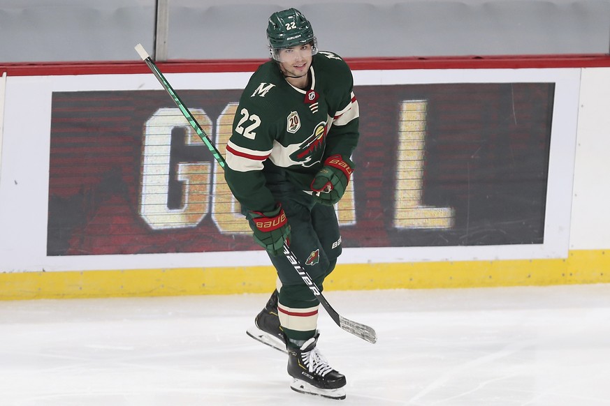 Minnesota Wild&#039;s Kevin Fiala (22) smiles after scoring a goal against the San Jose Sharks in the third period of an NHL hockey game Sunday, Jan. 24, 2021, in St. Paul, Minn. San Jose won 5-3. (AP ...