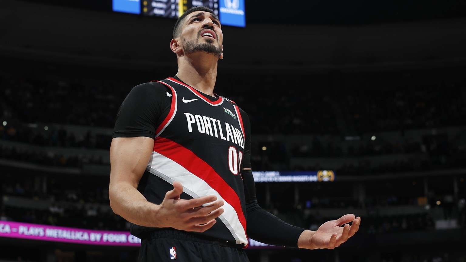 Portland Trail Blazers center Enes Kanter reacts after being called for a foul against the Denver Nuggets in the first half of Game 1 of an NBA basketball second-round playoff series Monday, April 29, ...