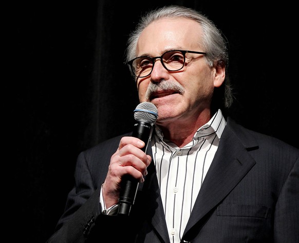 In this Jan. 31, 2014 photo, David Pecker, Chairman and CEO of American Media, addresses those attending the Shape &amp; Men&#039;s Fitness Super Bowl Party in New York. The Aug. 21, 2018 plea deal re ...