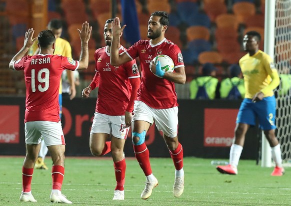 epa08259920 Al-Ahly player Mohamed Magdy (L) celebrates with Marwan Mohsen during the first leg of CAF champion league soccer match between Al-Ahly and Mamelodi Sundown at Cairo Stadium in Cairo Egypt ...