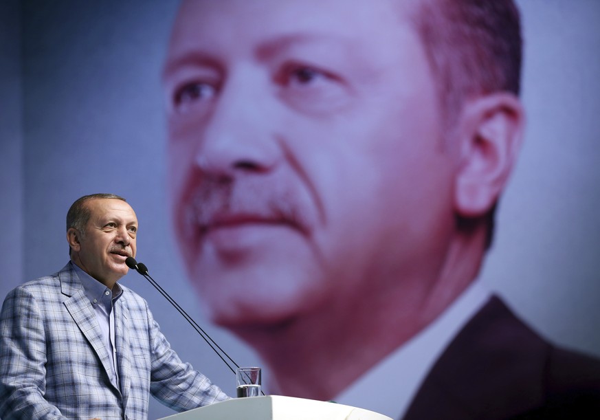 Turkey&#039;s President and leader of ruling Justice and Development Party Recep Tayyip Erdogan addresses his party members in Istanbul, Sunday, June 25, 2017. Erdogan on Sunday rejected a demand by m ...
