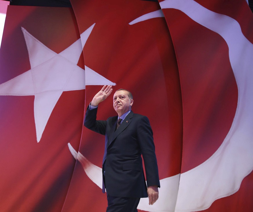 In this late Wednesday, April 12, 2017 photo, Turkey&#039;s President Recep Tayyip Erdogan addresses his supporters during a referendum meeting in Istanbul. Turkey is heading to a contentious April 16 ...