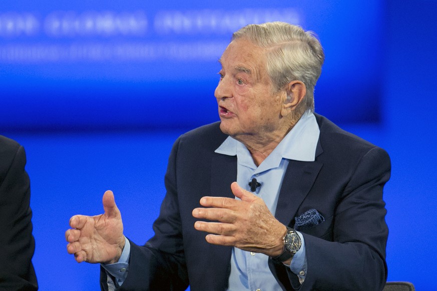 FILE - In this Sept. 27, 2015, file photo, George Soros, chairman of Soros Fund Management, talks during a television interview for CNN at the Clinton Global Initiative in New York. Soros, the New Yor ...