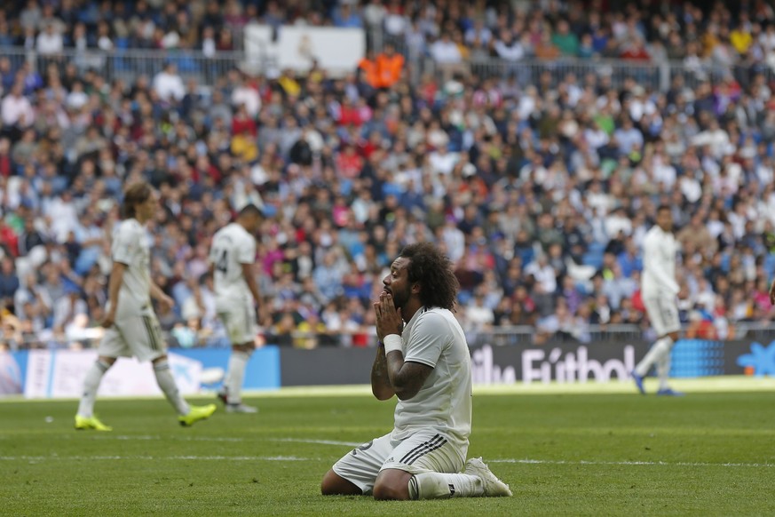 Real Madrid&#039;s Marcelo reacts after a missed opportunity during a Spanish La Liga soccer match between Real Madrid and Levante at the Santiago Bernabeu stadium in Madrid, Spain, Saturday, Oct. 20, ...