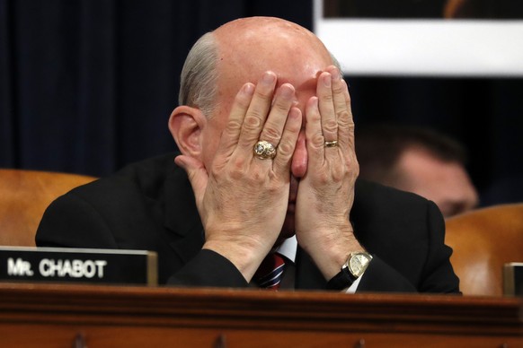 Rep. Louie Gohmert, R-Texas, rubs his face during a House Judiciary Committee markup of the articles of impeachment against President Donald Trump, Wednesday, Dec. 11, 2019, on Capitol Hill in Washing ...