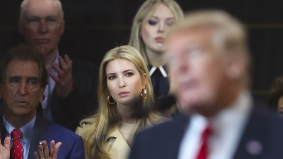 Ivanka Trump, the daughter and assistant to President Donald Trump, listens to her father speak at Local 18 Richfield Training Facility, Thursday, March 29, 2018, in Richfield, Ohio. Also at the event ...