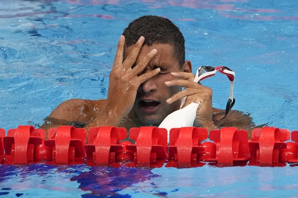 Ahmed Hafnaoui, of Tunisia, reacts after winning the final of the men&#039;s 400-meter freestyle at the 2020 Summer Olympics, Sunday, July 25, 2021, in Tokyo, Japan. (AP Photo/Petr David Josek)
Ahmed  ...