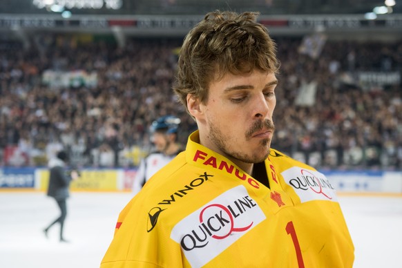 Bienne&#039;s goalkeeper Jonas Hiller reacts at the end of the sixth match of the semifinal of National League Swiss Championship 2017/18 between HC Lugano and EHC Bienne, at the ice stadium Resega in ...