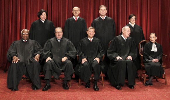 FILE - In this Oct. 8, 2010, file photo members of the U.S. Supreme Court gather for a group portrait at the Supreme Court in Washington. Seated from left are: Associate Justices Clarence Thomas, Anto ...
