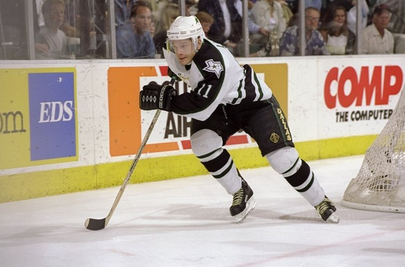 26 May 1998: Juha Lind #11 of the Dallas Stars in action during the NHL Western Conference Final game against the Detroit Red Wings at the Reunion Arena in Dallas, Texas. The Stars defeated the Red Wi ...