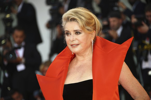 Actress Catherine Deneuve poses for photographers upon arrival at the premiere of the film &#039;The Truth&#039; and the opening gala of the 76th edition of the Venice Film Festival, Venice, Italy, We ...